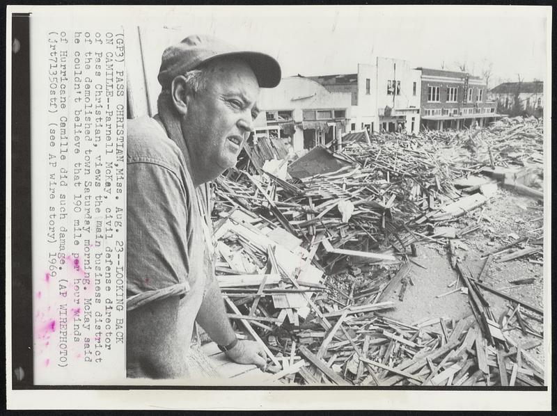 Looking Back on Camille--Parnell McKay, civil defense director of Pass Christian, views the main business district of the demolished town Saturday mor, 1969