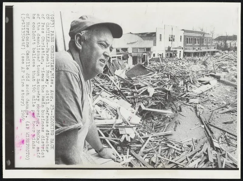 Looking Back on Camille--Parnell McKay, civil defense director of Pass Christian, views the main business district of the demolished town Saturday mor, 1969
