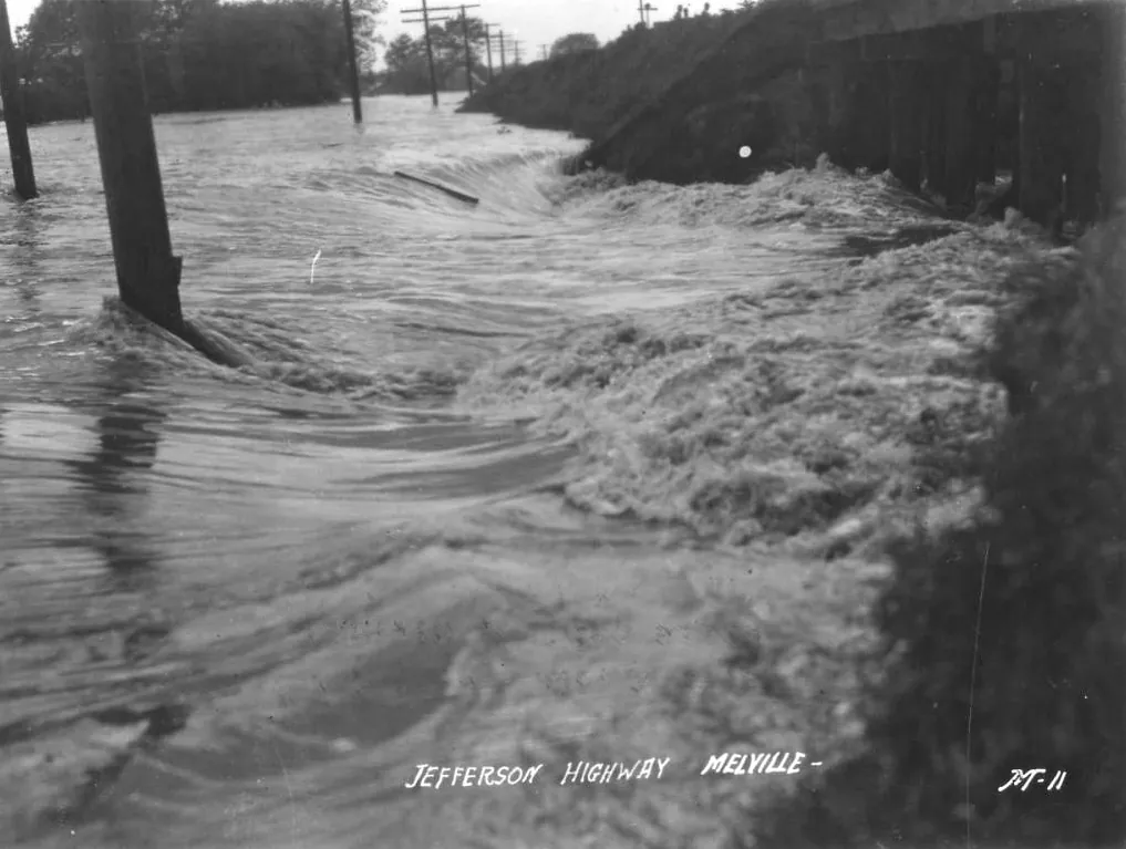 Jefferson Highway at Melville, Louisiana, in the 1927 flood — what the levee break looked like inland