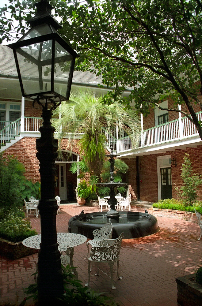 Hotel Provincial Courtyard — Military Hospital Turned Garden Oasis